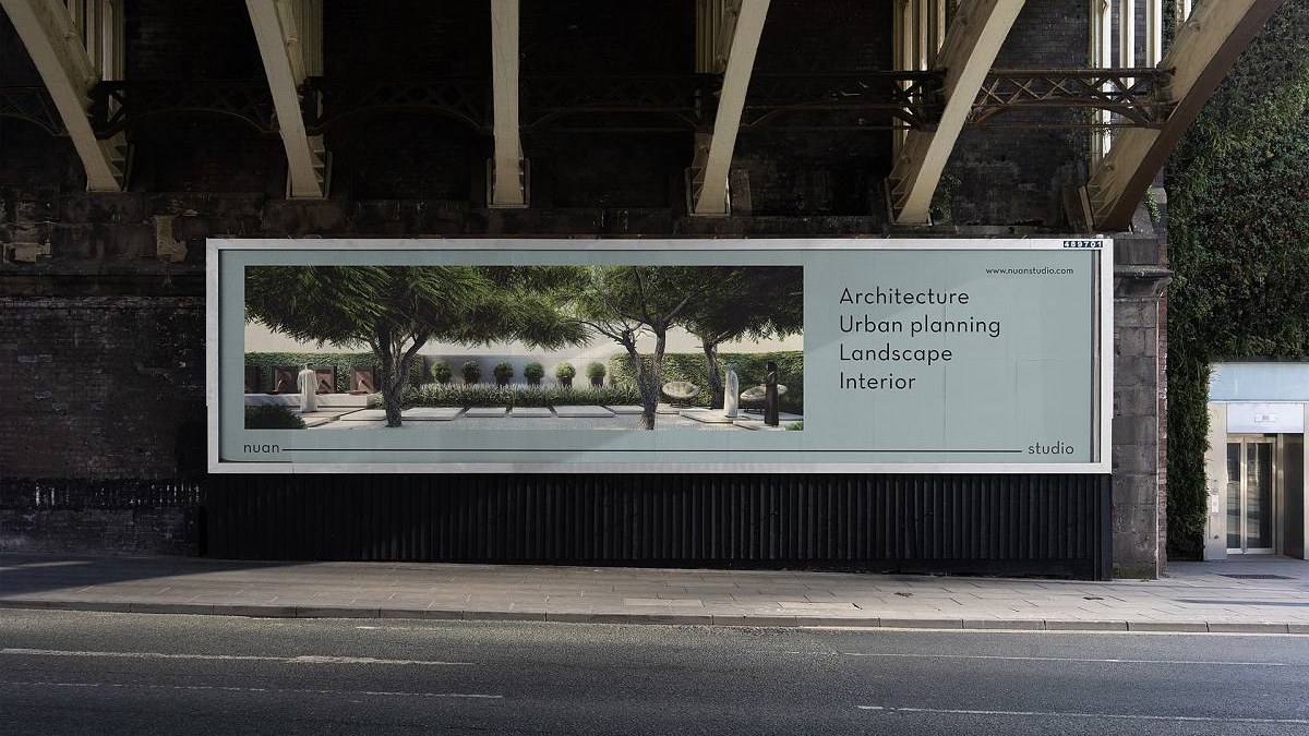 Outdoor advertising light box with a rectangular metal frame mounted beside a walkway