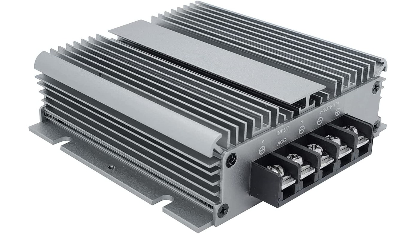 Electronic device with a finned aluminum heat-dissipation housing and terminal connections