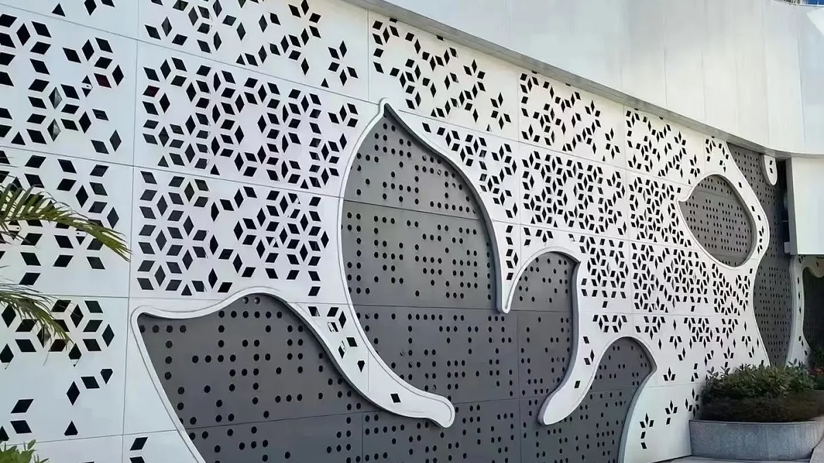 Decorative facade with perforated geometric metal panels