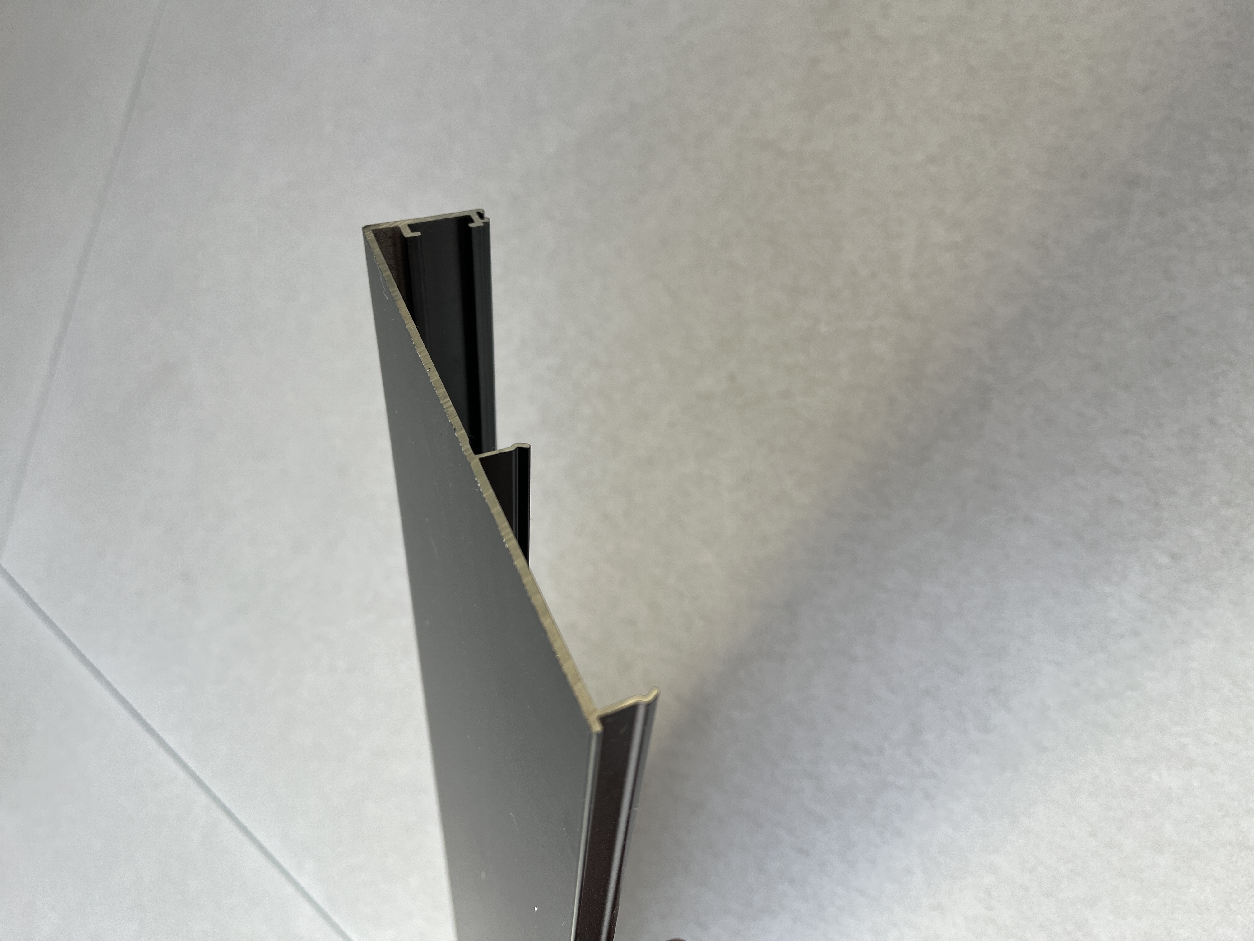 Close-up of the cut end of an aluminum profile.